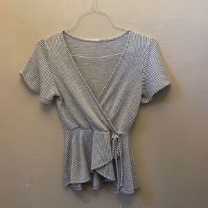Caution to the wind wrap around top! Size Med
